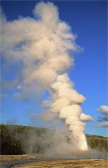 Old faithful erupting, Yellowstone National Park, Wyoming, USA Old faithful erupting, Yellowstone National Park, Wyoming, USA