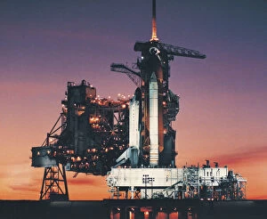 Images Dated 14th September 2005: Space Shuttle Columbia on launch pad and the setting sun