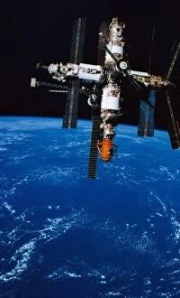 Researching Collection: A space station in orbit above earth