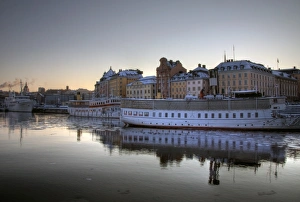 Stockholm Gamla Stan and boats at winter sunset Stockholm Gamla Stan and boats at winter sunset