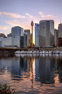 Sunrise View of Cockle Bay Wharf in Darling Harbour and Sydney Tower Eye, New South Wales Sunrise View of Cockle Bay Wharf in Darling Harbour and Sydney Tower Eye, New South Wales