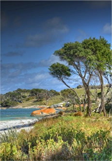 A view of the boulders and rocky coastline at Sawyers Bay on Flinders Island, Bass Strait, Tasmania, Australia A view of the boulders and rocky coastline at Sawyers Bay on Flinders Island, Bass Strait, Tasmania, Australia
