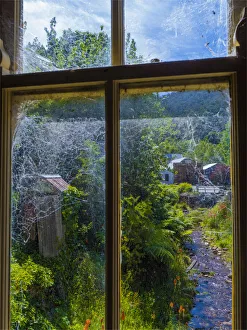 A viewpoint through a window in the quaint settlement of Walhalla A viewpoint through a window in the quaint settlement of Walhalla