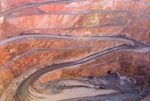 Aerial Views Gallery: Winding Road down to the entry of a Gold Mine with a dump truck