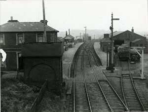View looking east towards Braintree at Dunmow Station about 1911. Water tank in foreground