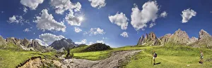 360 panoramic view of the Geisler Mountains, two hikers walking near Mittagsscharte gorge, Puez-Geisler Nature Park 360 panoramic view of the Geisler Mountains, two hikers walking near Mittagsscharte gorge, Puez-Geisler Nature Park