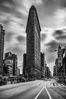 <b class=qtipBold><figcaption>46 Seconds at Rush Hour</figcaption></b><br>Decide to go up to NYC for the day from DC because the weather forecast was partly cloudy and I wanted to get the Flatiron Building with 10 stop ND. I used a Lee .9 hard stop graduated filter for total 13 stops for the sky. Taken at 3pm on a busy Friday rush hour NYC. This is the 46 second version with the wind gust swirling at the time.<br><em>© Kevin Voelker Photography</em> 46 Seconds at Rush Hour
