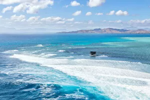 Surfing Collection: Aerial of Cloudbreak reef surf spot, Fiji