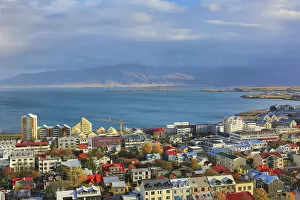 Aerial Views Gallery: Aerial view over downtown Reykjavik with ocean and mountain at back, Iceland