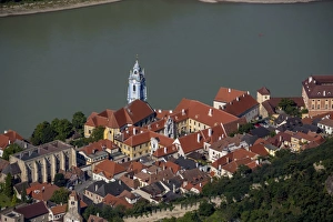 Aerial view, Durnstein Abbey, former monastery, church in blue and white, Durnstein, Lower Austria, Austria Aerial view, Durnstein Abbey, former monastery, church in blue and white, Durnstein, Lower Austria, Austria