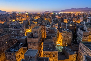 Aerial view of Sanaa cityscape at twilight, Yemen Aerial view of Sanaa cityscape at twilight, Yemen