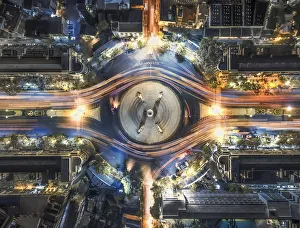 aerial top view traffic circle with speed light in city at night , Democracy Monument aerial top view traffic circle with speed light in city at night , Democracy Monument