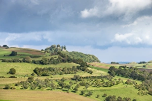 Agricultural land in the hills of the Hegau region with fields, orchards and pastures Agricultural land in the hills of the Hegau region with fields, orchards and pastures