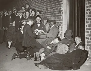 <b class=qtipBold><figcaption>All-Night Queue</figcaption></b><br>Cricket fans pass the time with a game of cards in an all-night queue outside Lord's Cricket Ground, London, circa 1930. (Photo by Evening Standard/Keystone/FPG/Hulton Archive/Getty Images)<br><em>© 2008 Getty Images</em> All-Night Queue