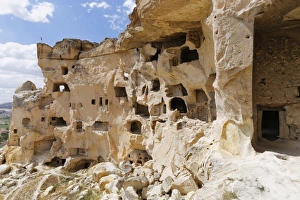 Ancient cave dwellings, Cavusin, Goreme National Park, Nevsehir Province, Cappadocia Ancient cave dwellings, Cavusin, Goreme National Park, Nevsehir Province, Cappadocia