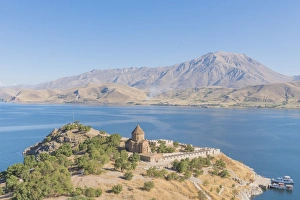 The Armenian Cathedral Church of the Holy Cross in Akdamar Island in Van Lake, Turkey The Armenian Cathedral Church of the Holy Cross in Akdamar Island in Van Lake, Turkey