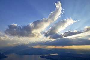 Atmospheric clouds above Lake Lucerne, Mount Pilatus at back, Vitznau, Canton of Schwyz Atmospheric clouds above Lake Lucerne, Mount Pilatus at back, Vitznau, Canton of Schwyz