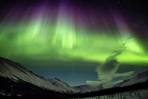 <b class=qtipBold><figcaption>Aurora Borealis Northern Light</figcaption></b><br>Stunning Aurora Borealis captured nearby TromsAž in Norway.<br><em>© HGabor</em> Aurora Borealis Northern Light