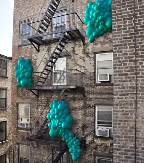 <b class=qtipBold><figcaption>Balloons popping out through windows</figcaption></b><br> Balloons popping out through windows