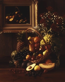Basket full of fruits and vegetables with vase on table Basket full of fruits and vegetables with vase on table