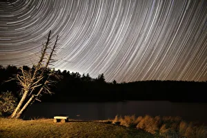 <b class=qtipBold><figcaption>Bass Lake Star Trails</figcaption></b><br>The Milky Way rising above Bass Lake located in Blowing Rock, NC.<br><em>© ROBERT LOE</em> Bass Lake Star Trails