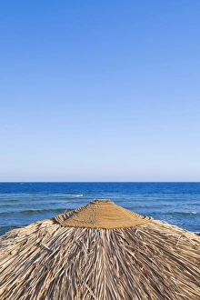 Beach parasol with sea view, Dahab, Egypt, Africa Beach parasol with sea view, Dahab, Egypt, Africa