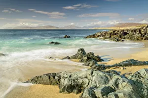 <b class=qtipBold><figcaption>Beach at Scarasta, Isle of Harris</figcaption></b><br>Aquamarine seas off the West coast of Harris in the outer Hebrides. In the distance is the Isle of Taransay & the mainland of Lewis.<br><em>© 2015 David N Moorhouse</em> Beach at Scarasta, Isle of Harris