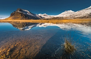 Beautiful scene of Snow mountain with reflection Beautiful scene of Snow mountain with reflection