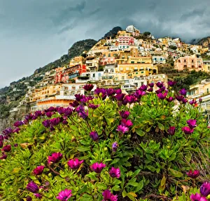 <b class=qtipBold><figcaption>Beautiful town of Positano, Italy</figcaption></b><br>Stormy day on beach in Positano, Italy. Looking up through beautiful flowers, towards residential houses on hills. It's one of most beautiful town at Amalfi coast.<br><em>© 2011 Xiaoyu Yu</em> Beautiful town of Positano, Italy