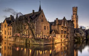 Belfries of Belgium and France Gallery: The Belfry in Bruges, Belgium Seen at Dusk along with Other Floodlit Buildings