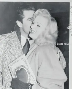 London Airport Arrivals Prints: Steve Cochran Kissing Sabrina