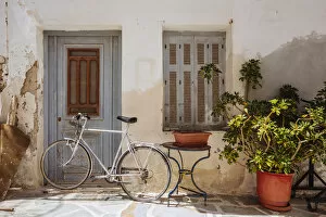 Bike near old house in Naxos town, Naxos, Greece