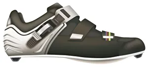 Black and silver sports shoe with studded sole, side view Black and silver sports shoe with studded sole, side view