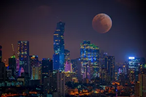 Bloody moon Bangkok night view with skyscrape Bloody moon Bangkok night view with skyscrape