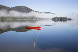 Boat on the lake, morning mist, Schliersee Lake, Schliersee, Upper Bavaria, Bavaria, Germany Boat on the lake, morning mist, Schliersee Lake, Schliersee, Upper Bavaria, Bavaria, Germany