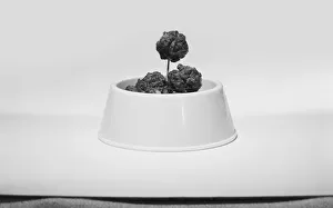 Bowl of meatballs against white background, close-up Bowl of meatballs against white background, close-up