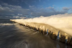 Breakwaters or groynes covered with snow and icicles, Baltic Sea, Zingst, Fischland-Darss-Zingst Breakwaters or groynes covered with snow and icicles, Baltic Sea, Zingst, Fischland-Darss-Zingst