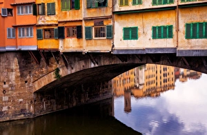 <b class=qtipBold><figcaption>Brightly Coloured</figcaption></b><br>Arno River reflect bright colors of buildings surrounding Ponte Vecchio.<br><em>© Jon and Tina Reid</em> Brightly Coloured