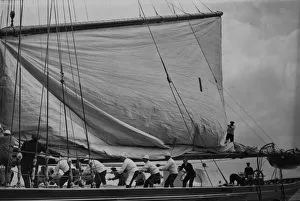 <b class=qtipBold><figcaption>Britannia</figcaption></b><br>circa 1926: The King's yacht sailing at Cowes on the Isle of Wight. The crew are seen hoisting the main sail. (Photo by Topical Press Agency/Getty Images) Britannia