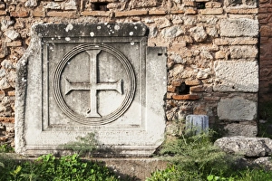 Broken stone structure with a cross Broken stone structure with a cross