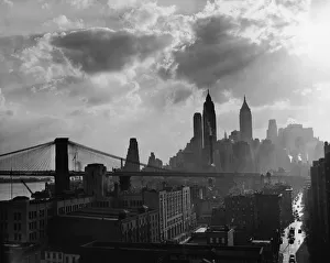 <b class=qtipBold><figcaption>Brooklyn Bridge & Manhattan Skyline</figcaption></b><br>View across the Brooklyn Bridge with the Manhattan skyline behind it, New York, New York, 1930s. (Photo by Lawrence Thornton/Getty Images)<br><em>© 2005 Getty Images</em> Brooklyn Bridge & Manhattan Skyline