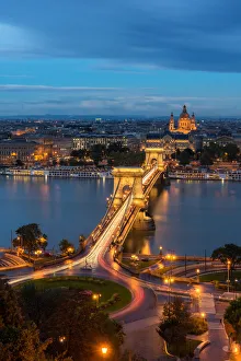 <b class=qtipBold><figcaption>Budapest Cityscape, Hungary</figcaption></b><br>Chain bridge and St. Stephen's Basilic after the sunset<br><em>© Anan Charoenkal</em> Budapest Cityscape, Hungary