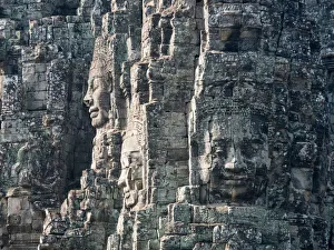 Buddhist faces on towers at Bayon Temple, Cambodia Buddhist faces on towers at Bayon Temple, Cambodia