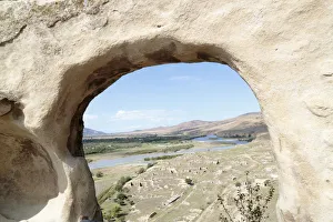 Building ruins framed by carved window at Uplistsikhe Cave Complex, Uplistsikhe, Georgia Building ruins framed by carved window at Uplistsikhe Cave Complex, Uplistsikhe, Georgia