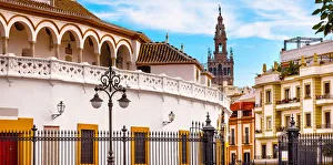 Bullring Stadium and Giralda Spire Bell Tower of Seville Cathedral, Seville, Andalusia, Spain Bullring Stadium and Giralda Spire Bell Tower of Seville Cathedral, Seville, Andalusia, Spain