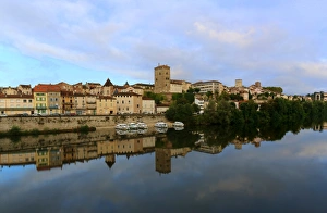 Cahors reflected in the river Lot, France Cahors reflected in the river Lot, France