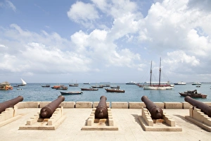 <b class=qtipBold><figcaption>Canons in the harbor of Stone Town</figcaption></b><br>Canons in the harbor of Stone Town, Zanzibar, Tanzania, East Africa.<br><em>© © 2013 by Santiago Urquijo - ALL RIGHTS RESERVED</em> Canons in the harbor of Stone Town