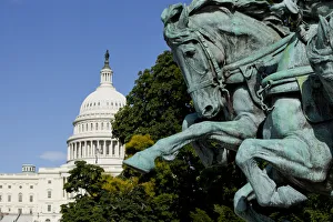 <b class=qtipBold><figcaption>Capitol Building, Washington, DC</figcaption></b><br>Close up of galloping horse sculpture in Civil War monument with Capitol Building in distance.<br><em>© Paul Souders | WorldFoto</em> Capitol Building, Washington, DC