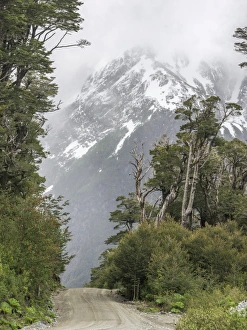 Carretera Austral, gravel road through untouched nature, Cisnes, Aysen Province, Chile Carretera Austral, gravel road through untouched nature, Cisnes, Aysen Province, Chile