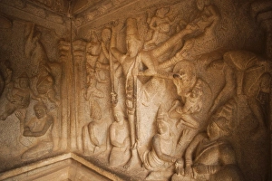 Carving details of Trivikrama the Vamana avatar of Vishnu with one leg on the earth Carving details of Trivikrama the Vamana avatar of Vishnu with one leg on the earth